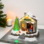 Casa di Babbo Natale con Albero natale rotante a batteria 20xH17cm